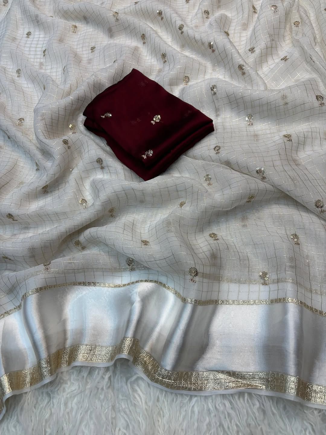Surabhi checks viscose saree with space silk blouse