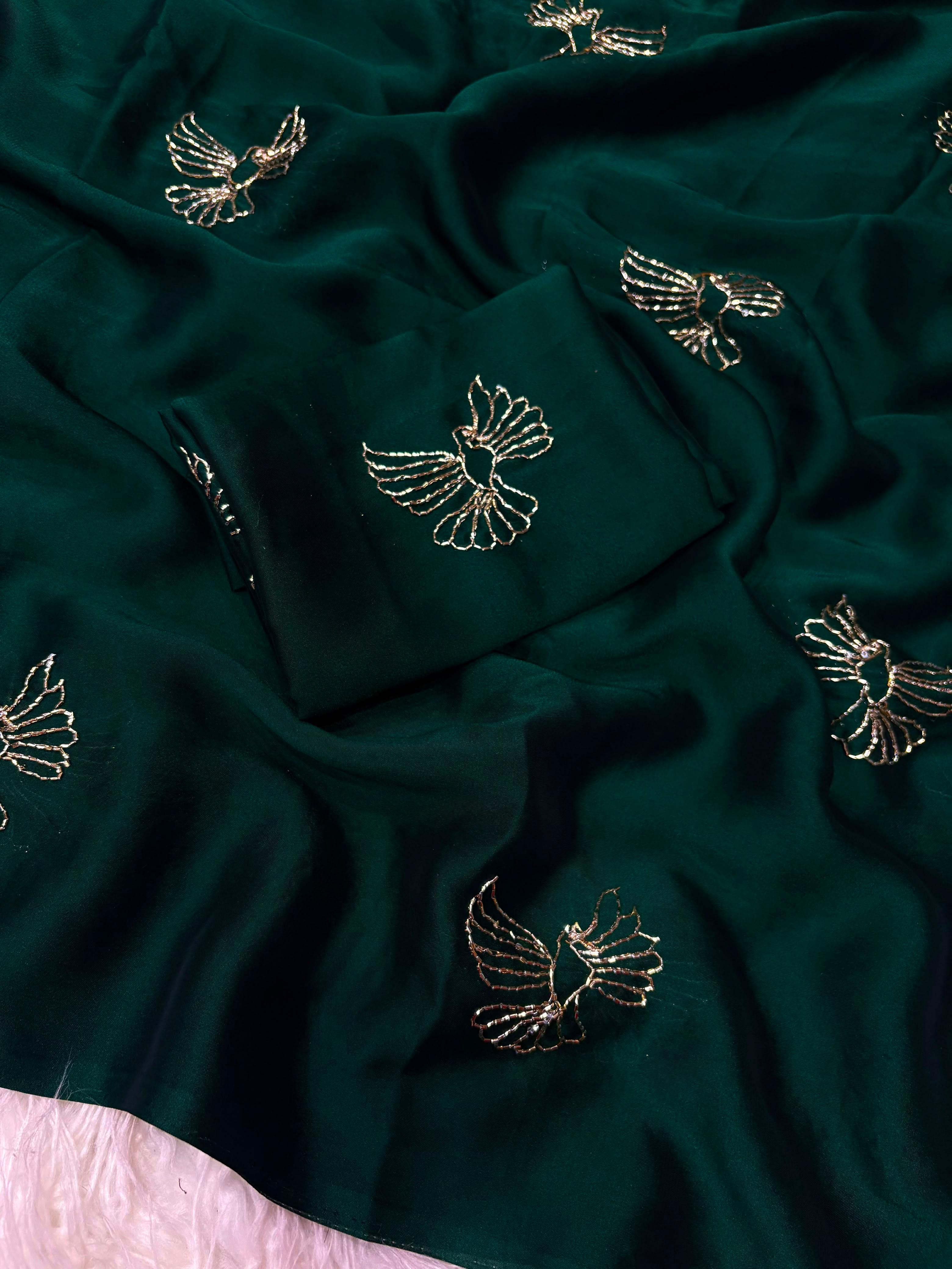 Soft rangoli bird design partywear saree
