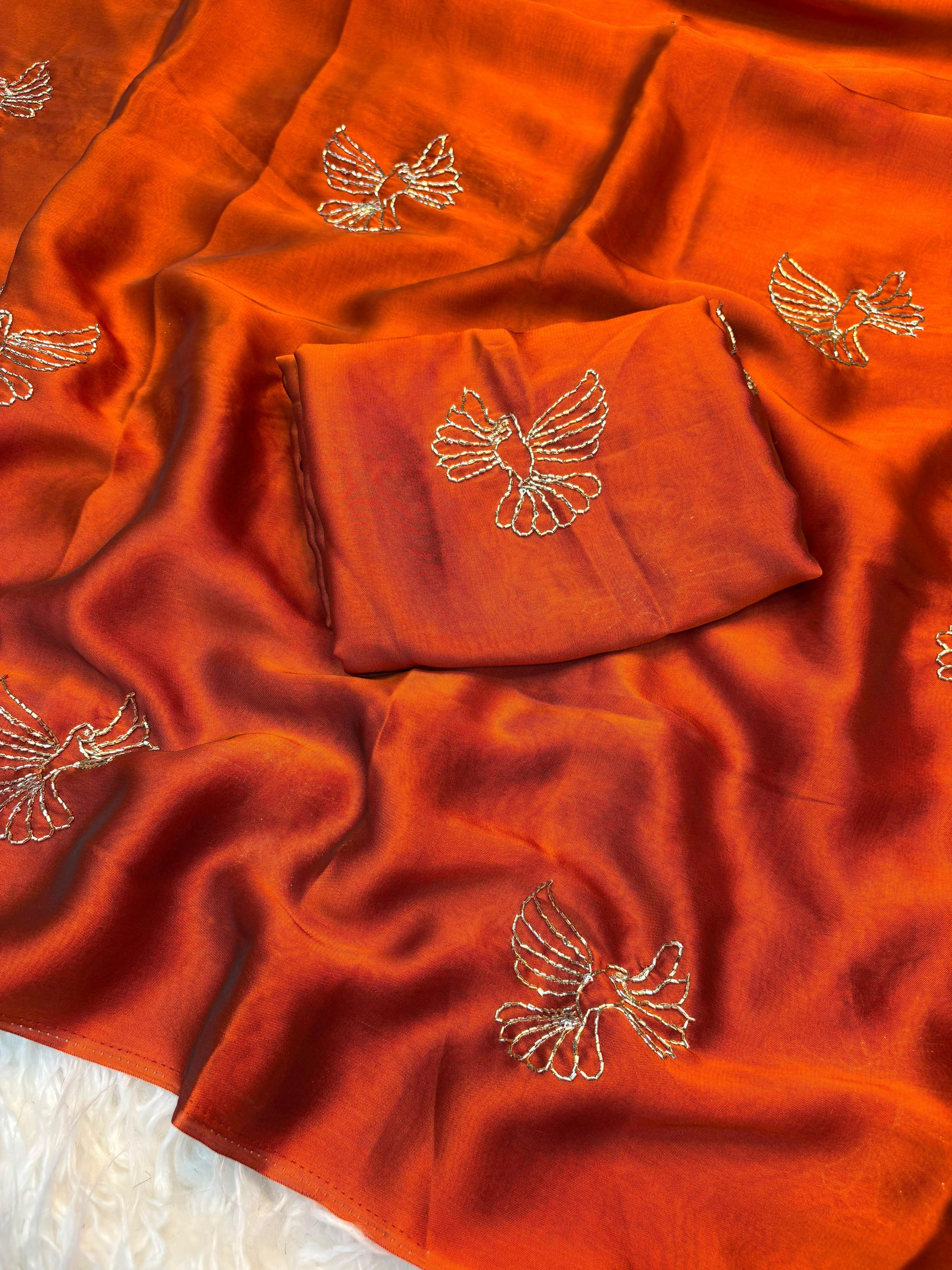 Soft rangoli bird design partywear saree