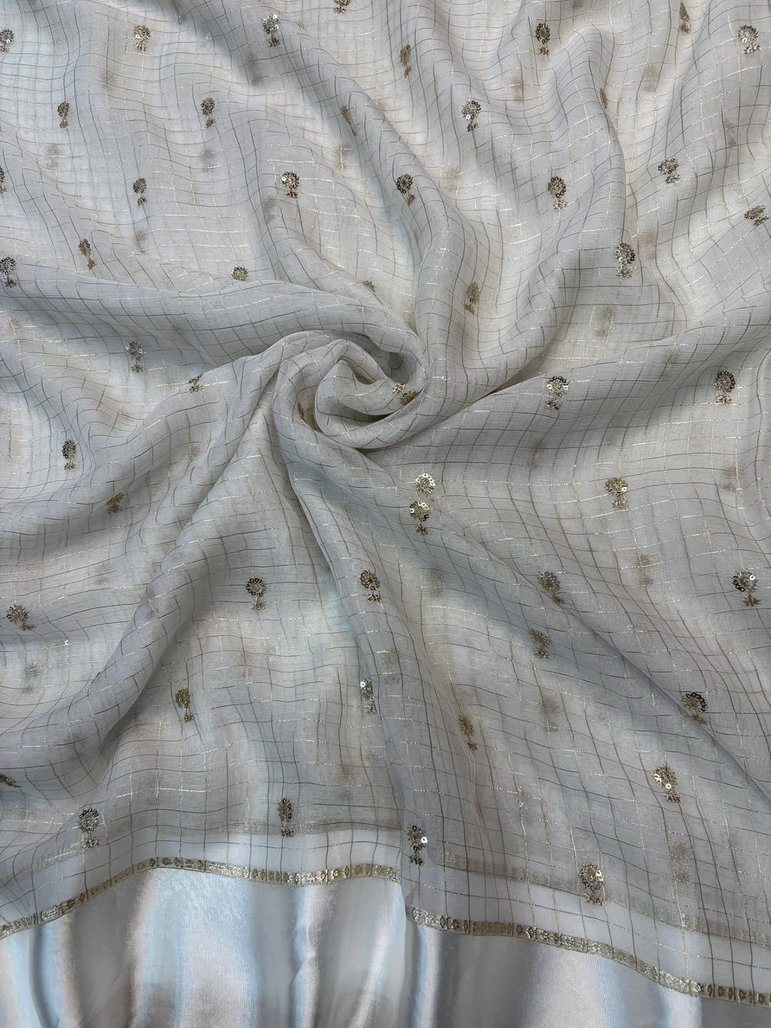 Surabhi checks viscose saree with space silk blouse