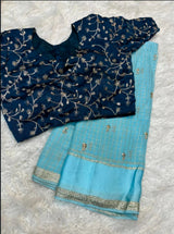Surabhi- Viscose Georgette weaving checks saree