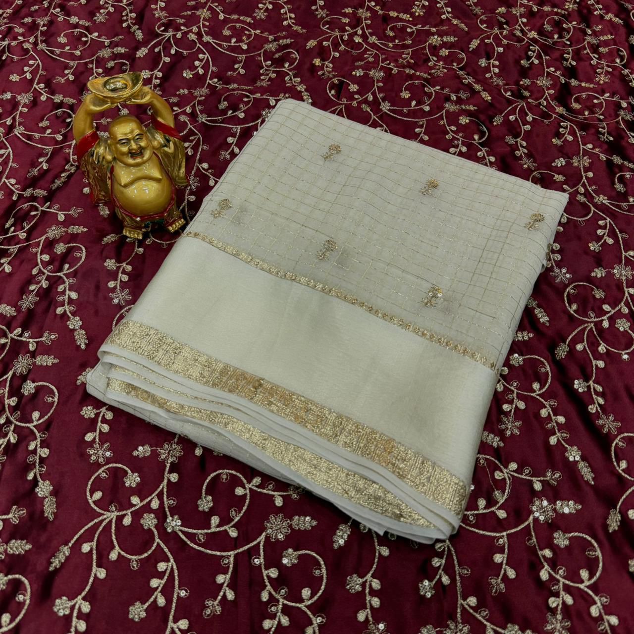 Surabhi- Viscose Georgette weaving checks saree