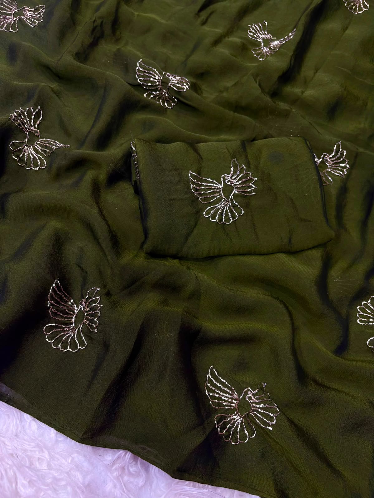 Soft rangoli bird design partywear saree