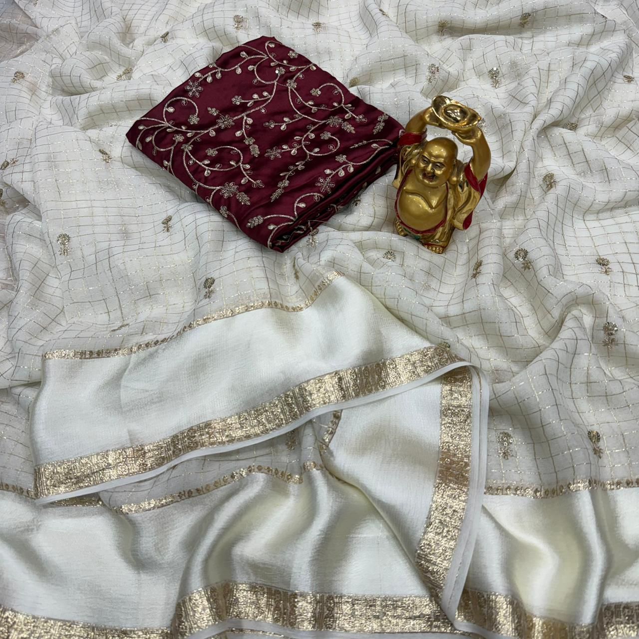 Surabhi- Viscose Georgette weaving checks saree