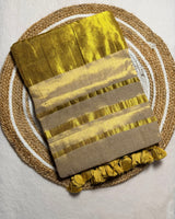 Kerala style gold tissue saree
